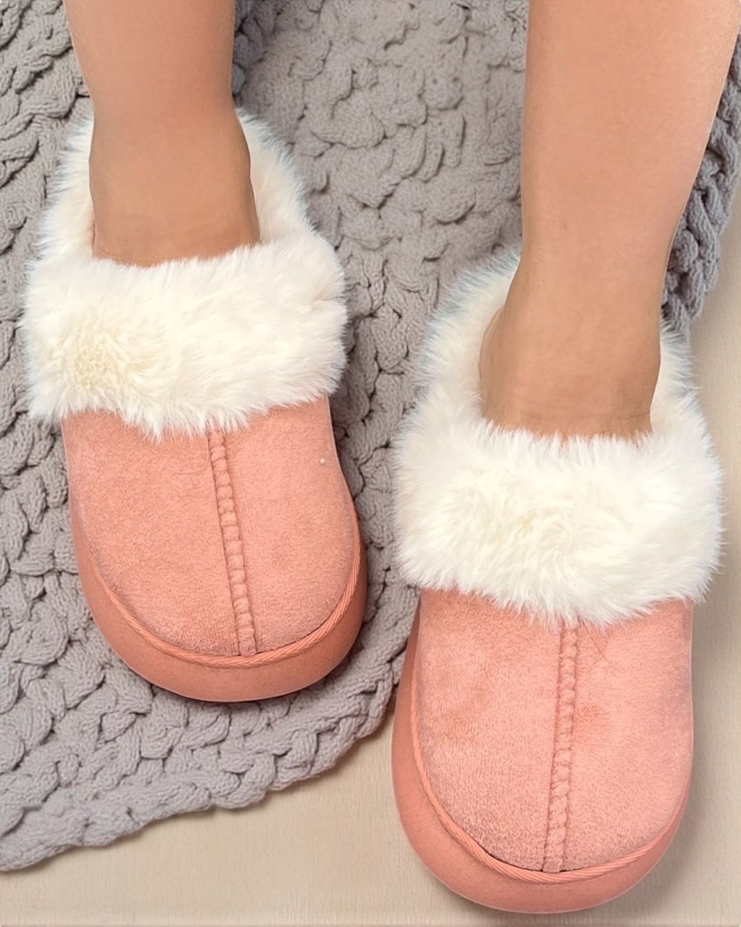 Pink fuzzy slippers