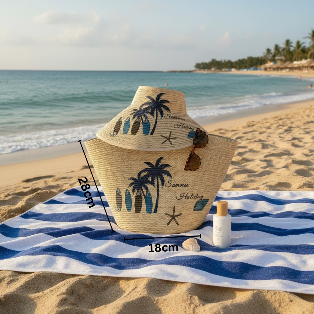Beige sun hat with palm tree design on a blue and white striped towel at the beach.