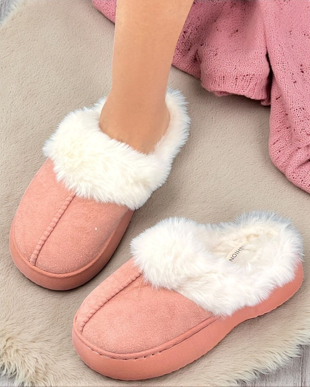 Pink fuzzy slippers