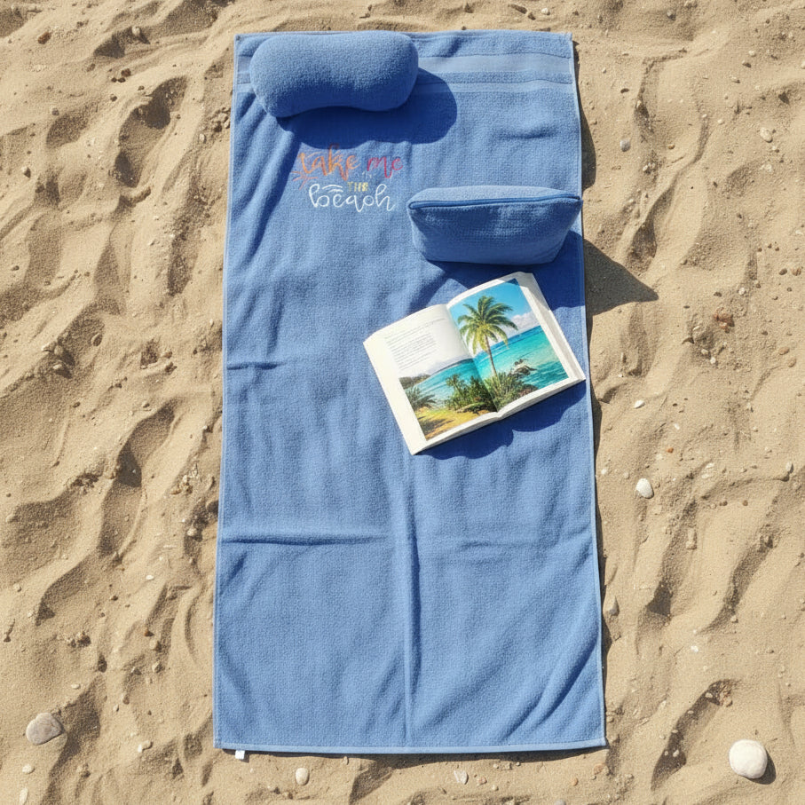 Blue towel set with text on the beach