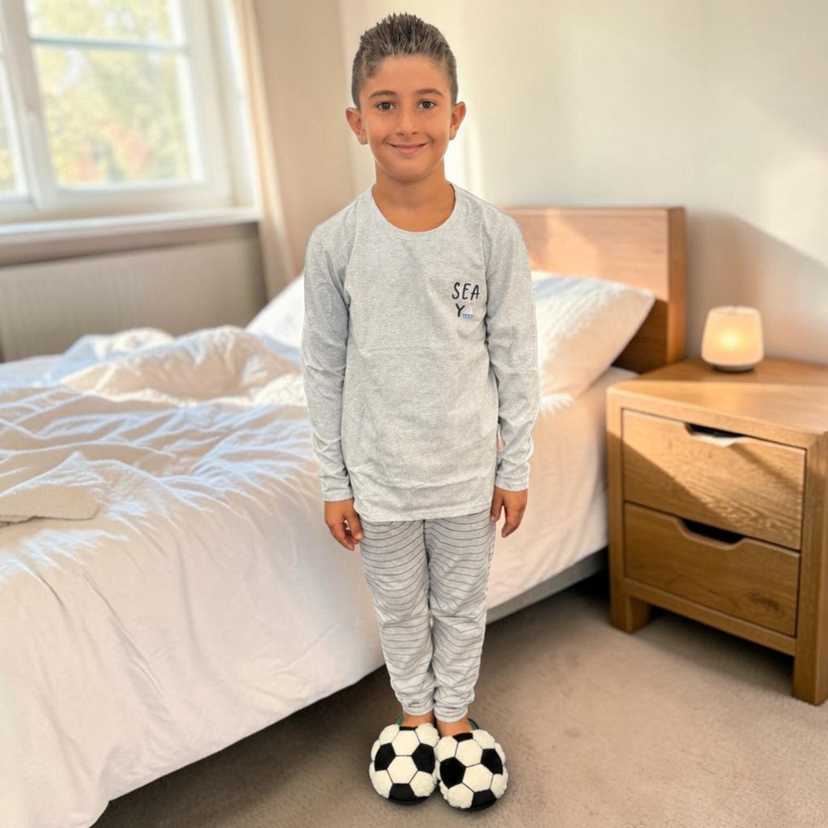 Boys grey marl long sleeve pyjama top with striped bottoms and football slippers