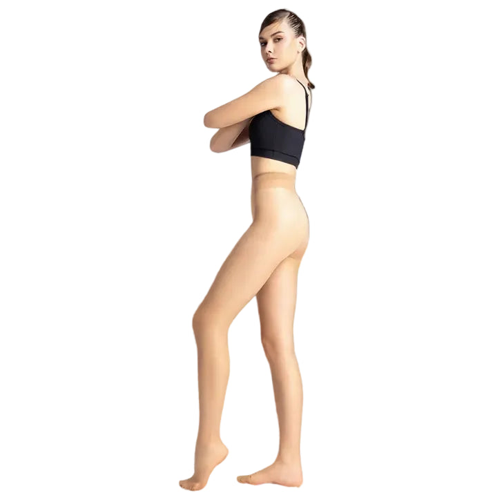 Camel sheer tights in profile, one leg bent at the knee
