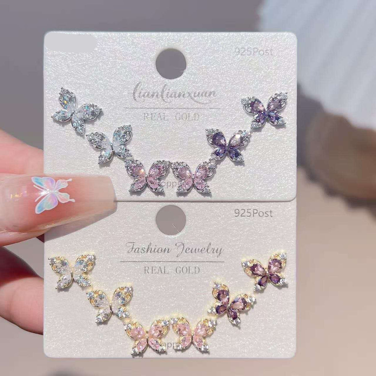 Set of three crystal butterfly stud earrings in blue, purple and pink, Jack Gifts Online Lebanon