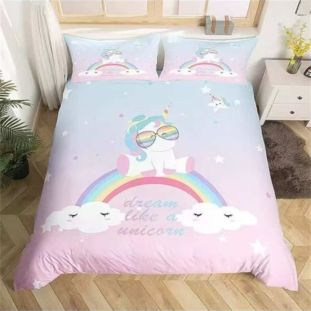 Pastel unicorn bedding set with rainbow, sleepy clouds and stars