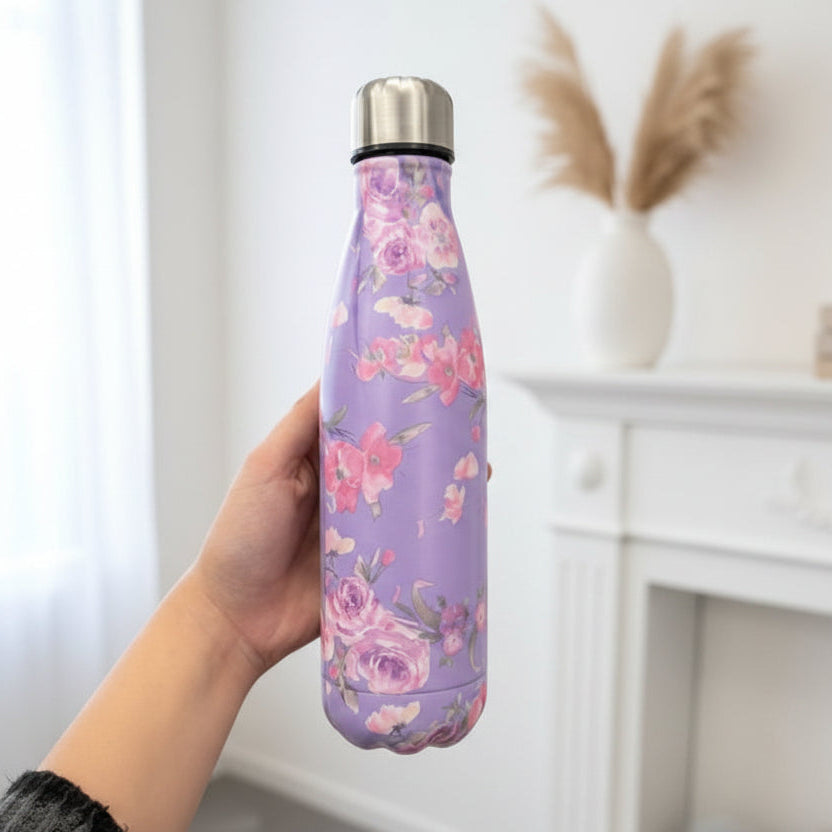 Lilac vacuum flask with watercolour pink roses held in a bright room