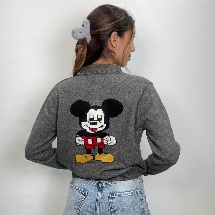Back view of a grey collared cardigan with a large cartoon mouse patch