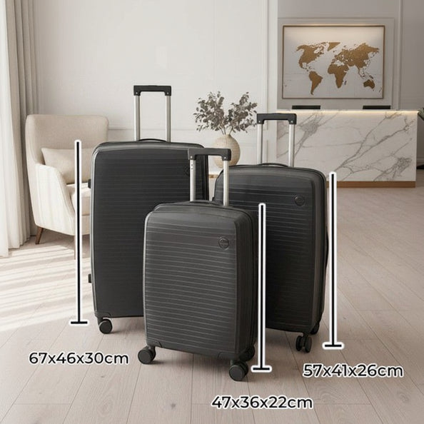 Grey hard shell luggage set of three with size labels