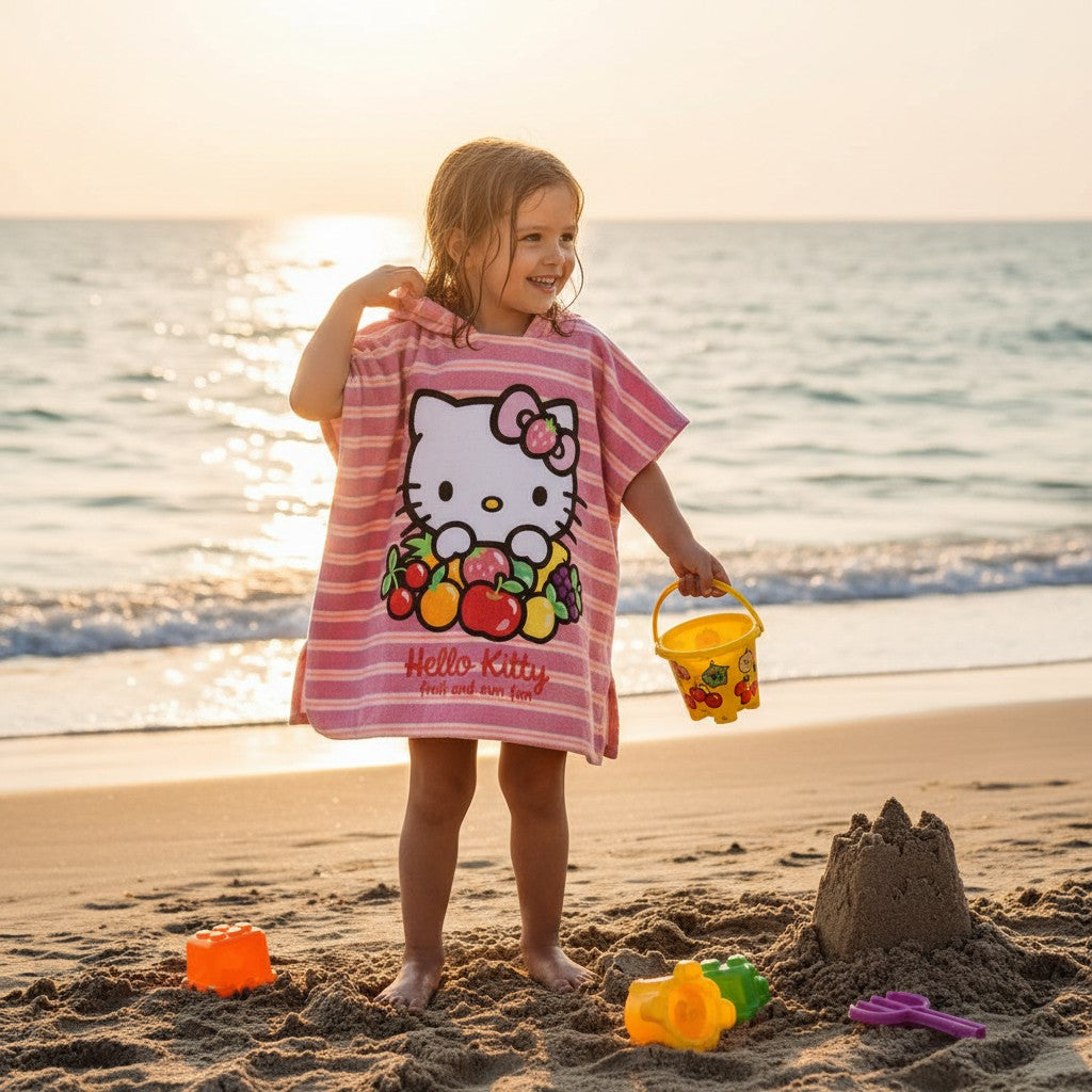 Girl wearing a Hello Kitty striped hooded poncho towel – Jack Gifts Online Lebanon