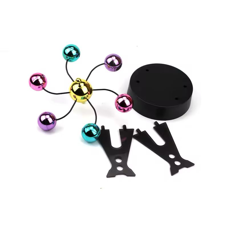 Desk gadget separated into its black base, two acrylic arch uprights and the ball rotor