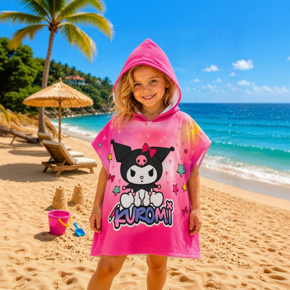 Girl wearing a Kuromi hooded beach poncho standing in the beach