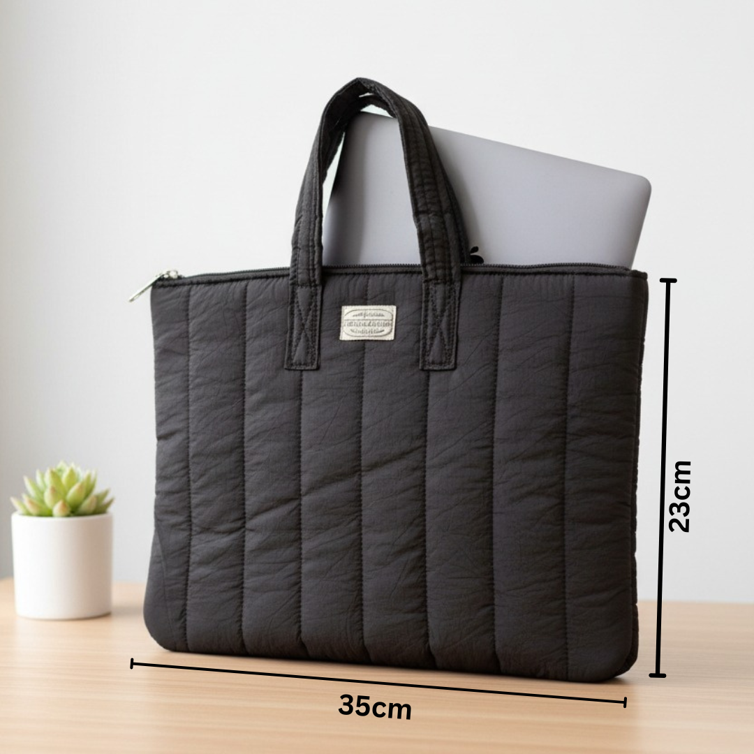 Black quilted laptop sleeve with size measurements