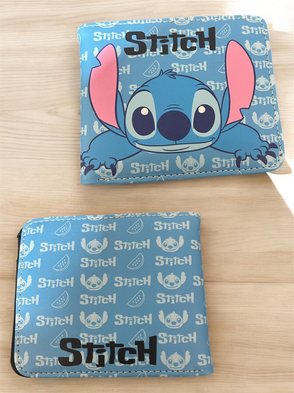 Light blue bifold wallet open flat showing an all over watermelon and Stitch face pattern