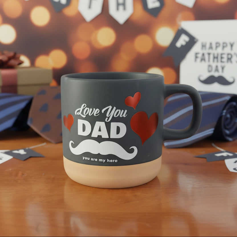 Gray mug with 'Love You Dad' text on a wooden surface