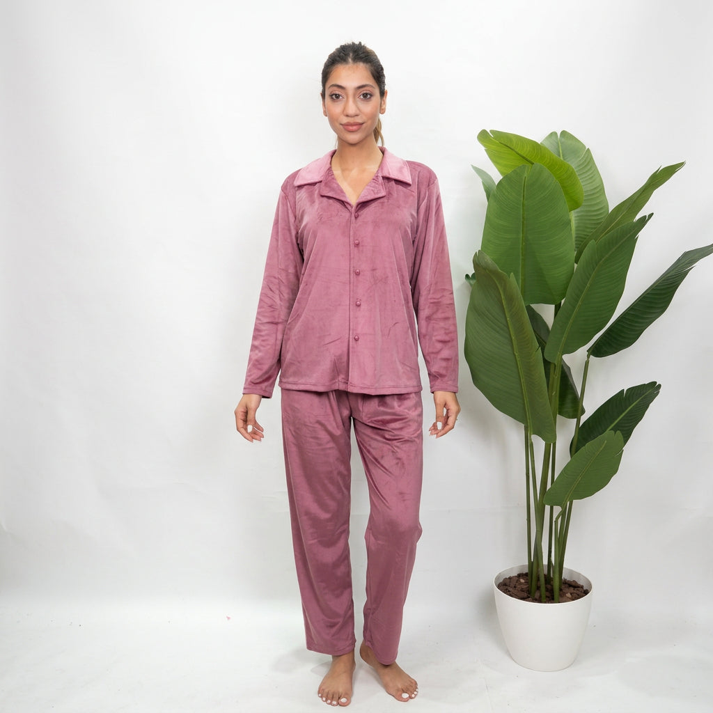 Front view of a mauve velvet PJ shirt with notch collar and button front worn with straight pants