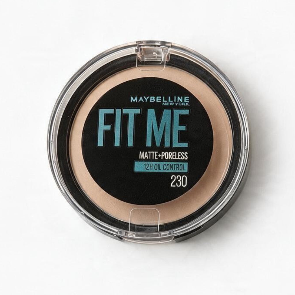 Maybelline Fit Me Matte Poreless pressed powder in shade 230, a small compact seen from above on white