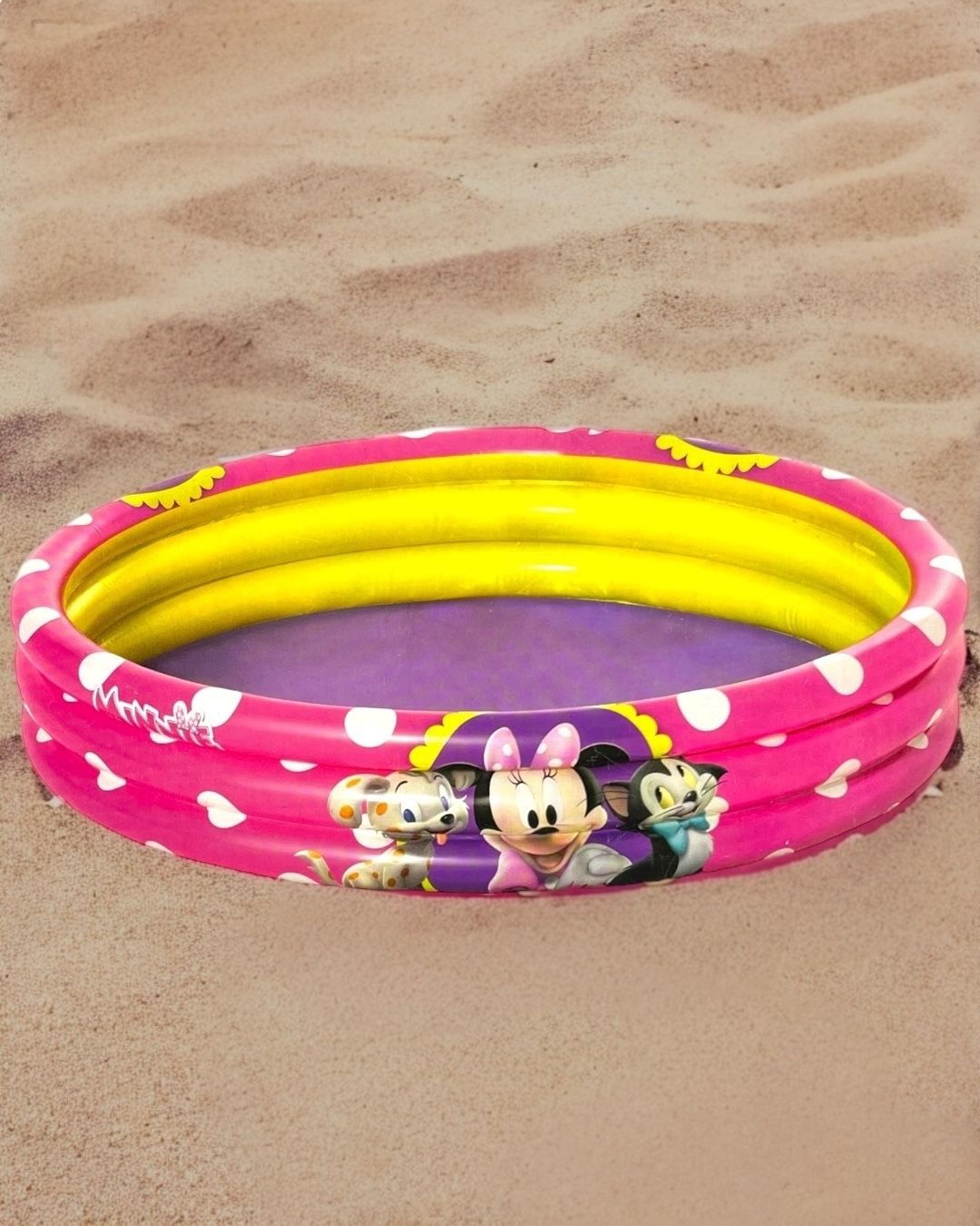 Pink and yellow three ring kids pool with polka dots and cartoon mouse and kitten artwork