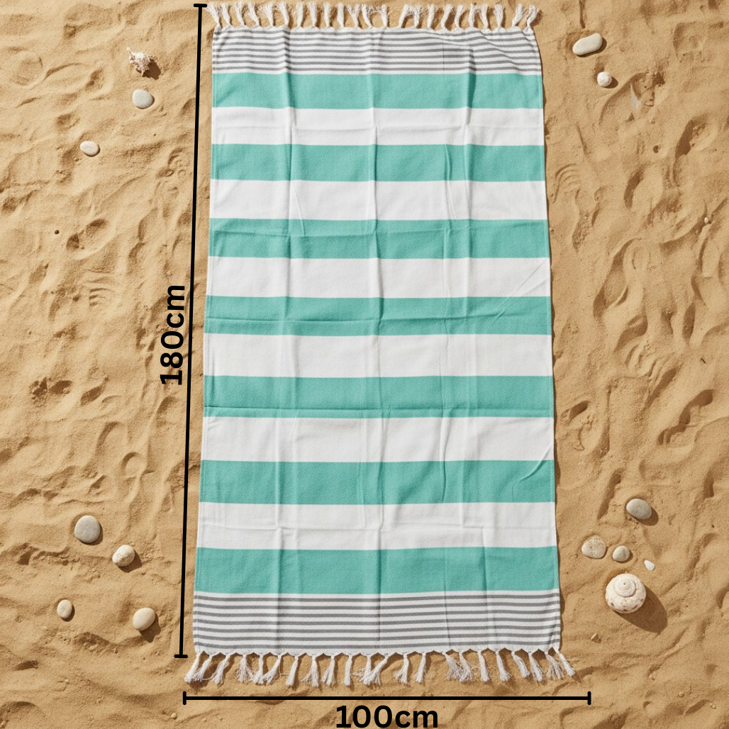 Teal and white striped towel on sand with measurement indicators