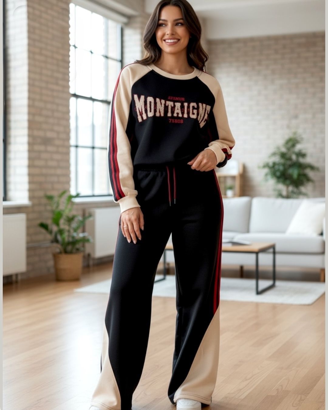 Woman wearing a Montaigne jogging set in a modern living room