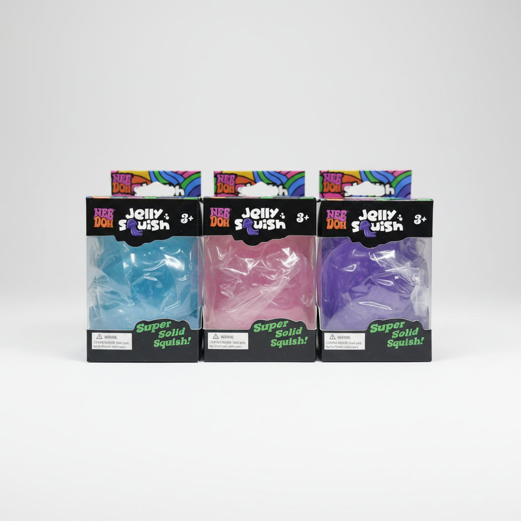 Three boxed NeeDoh Jelly Squish jellyfish toys in blue, pink and purple with clear window packaging