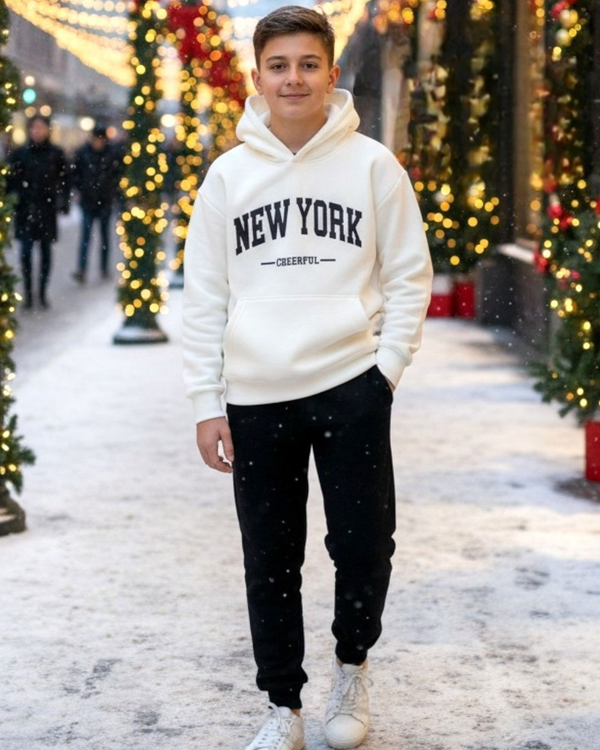 White New York hoodie and black joggers on a snowy street