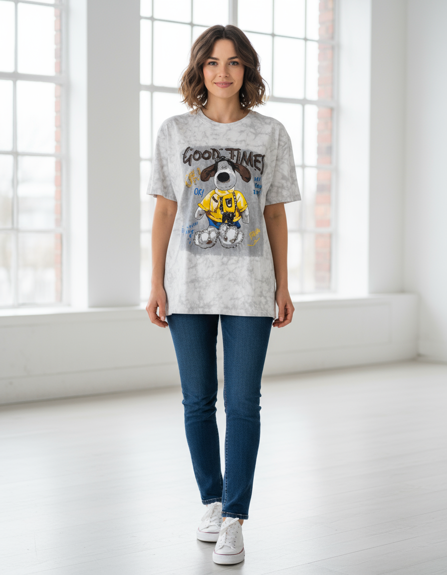 Woman wearing a graphic tshirt with a dog design and text in a bright room