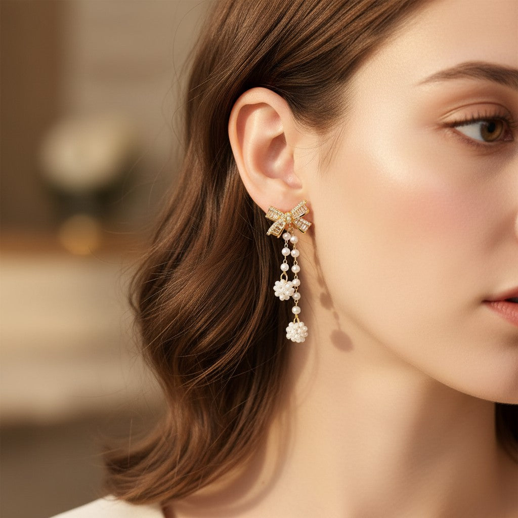 Gold crystal bow earrings with long pearl tassel drops, Jack Gifts Online Lebanon