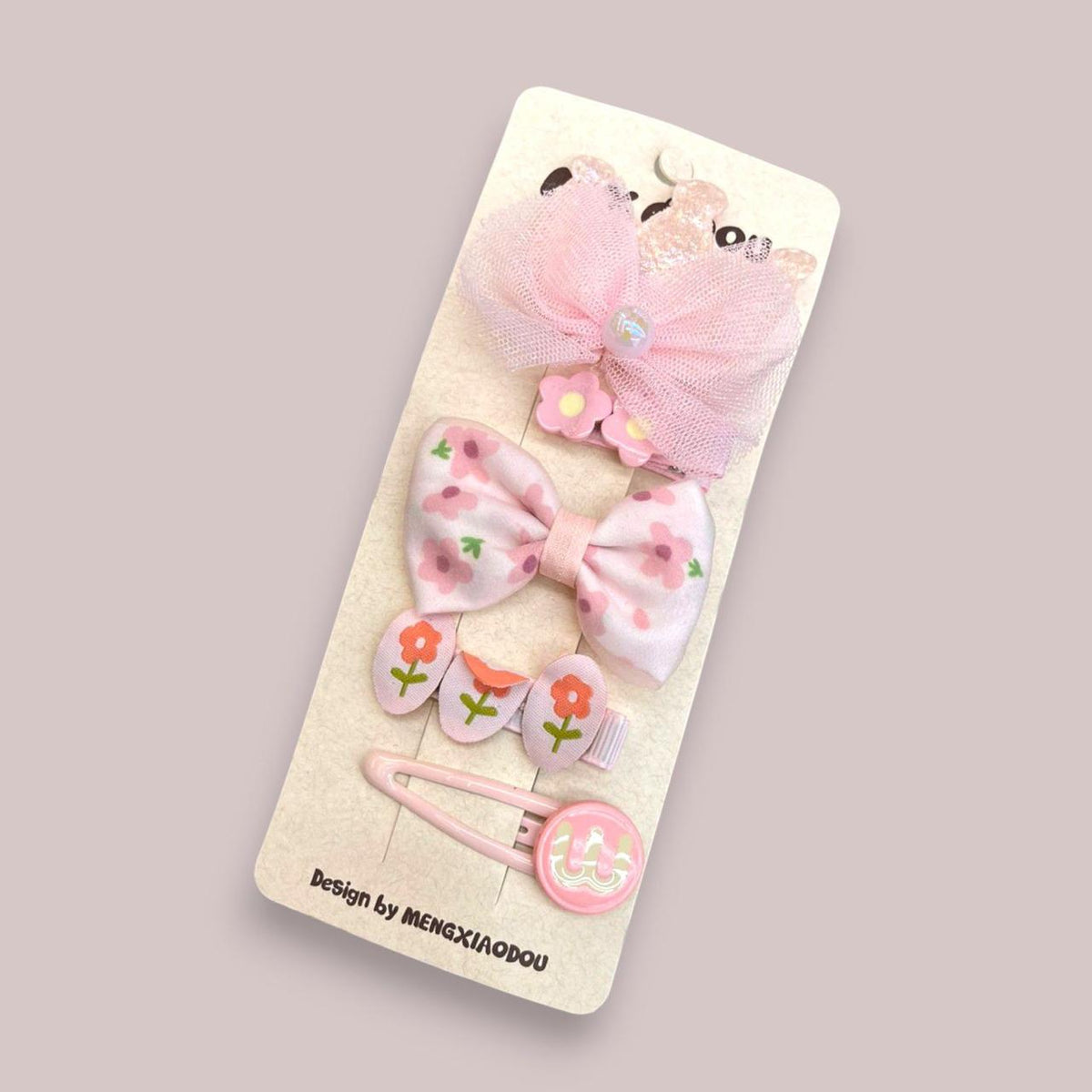 Pink hair accessory set with tulle bow, floral fabric bow, flower petal clip and smiley snap clip on card