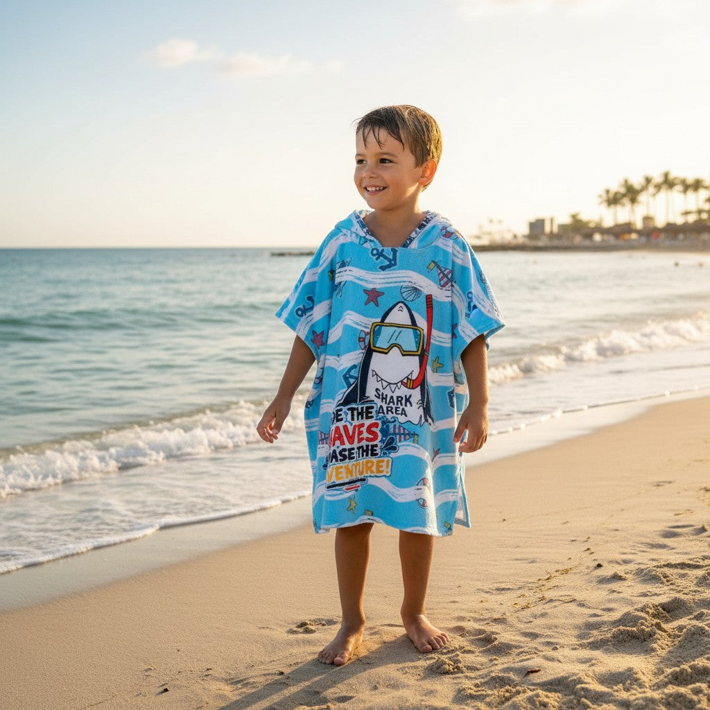 Boy wearing a snorkelling shark hooded poncho towel at the beach – Jack Gifts Online Lebanon