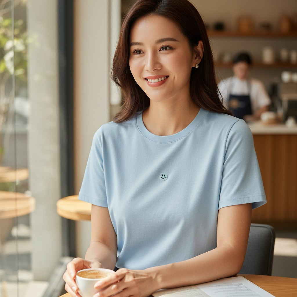 Light blue smiley face women's t-shirt