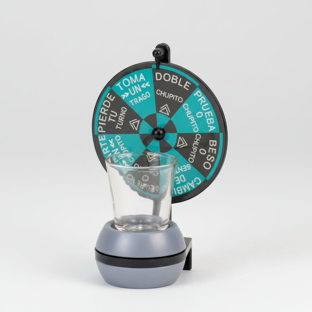 Spinning dare wheel in teal and charcoal on a post above a weighted base and shot glass