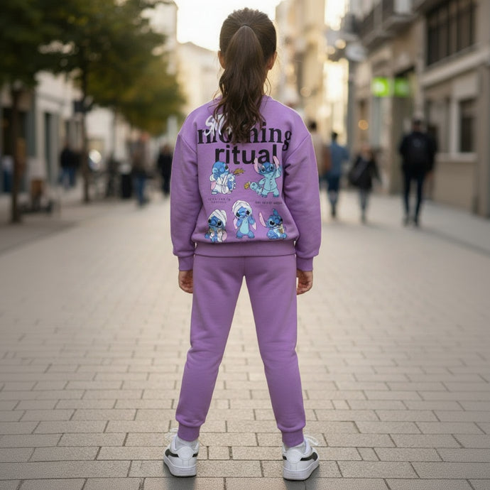 Back view of a lilac sweatshirt showing a large slogan and blue character across the shoulders