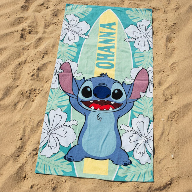 Towel with cartoon character on a sandy background