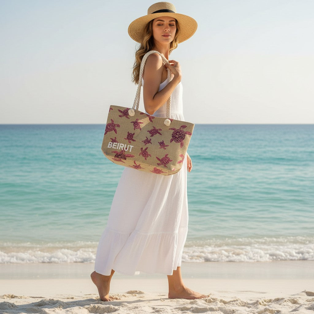 Woman holding a tote bag with 'Beirut' text on a beach