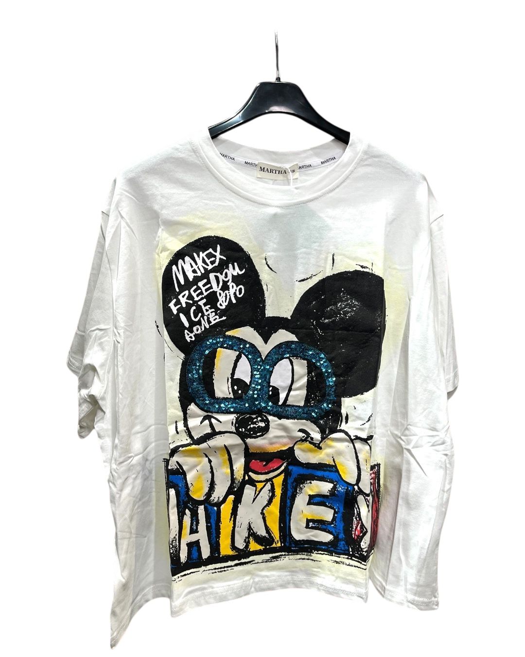 A white oversized tshirt with a graphic print of Mickey Mouse wearing glasses
