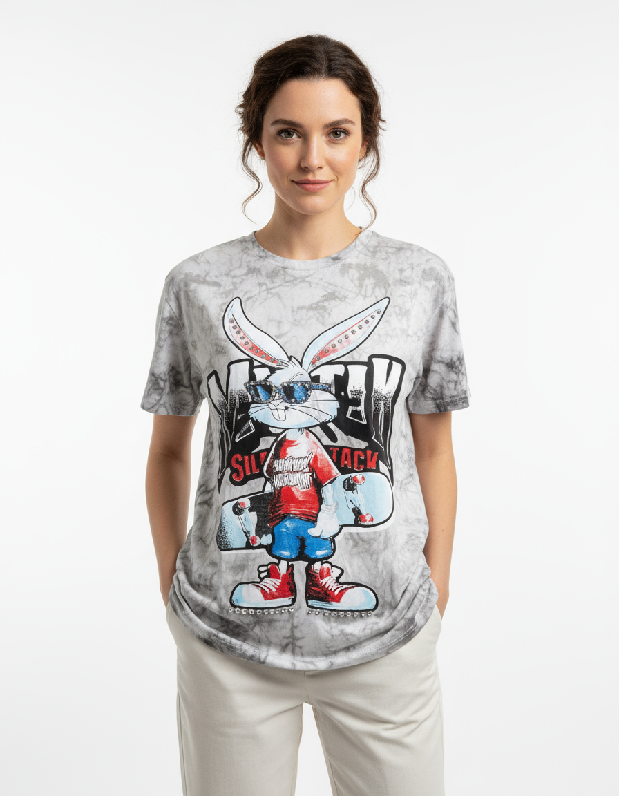 Woman wearing a white tshirt with a cartoon character design on a white background