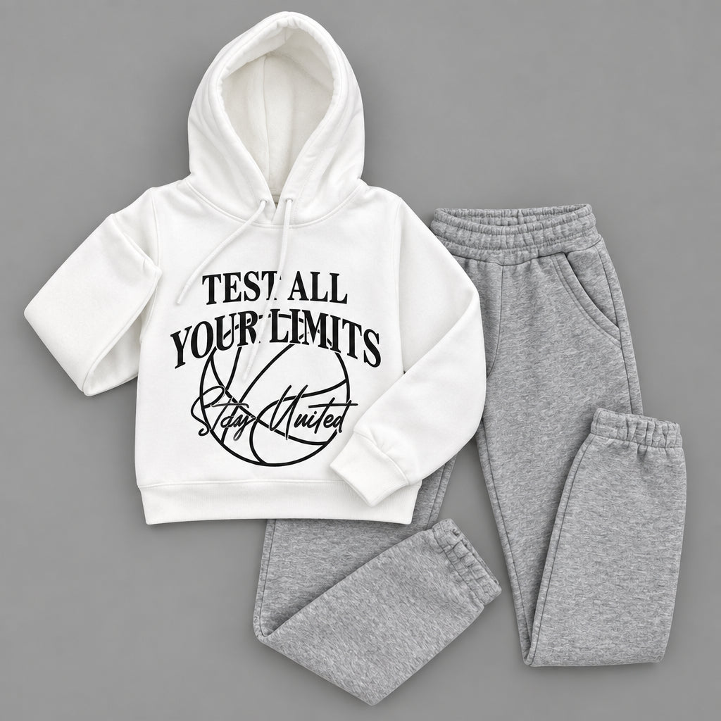 White hoodie with Test All Your Limits print laid out with grey marl joggers