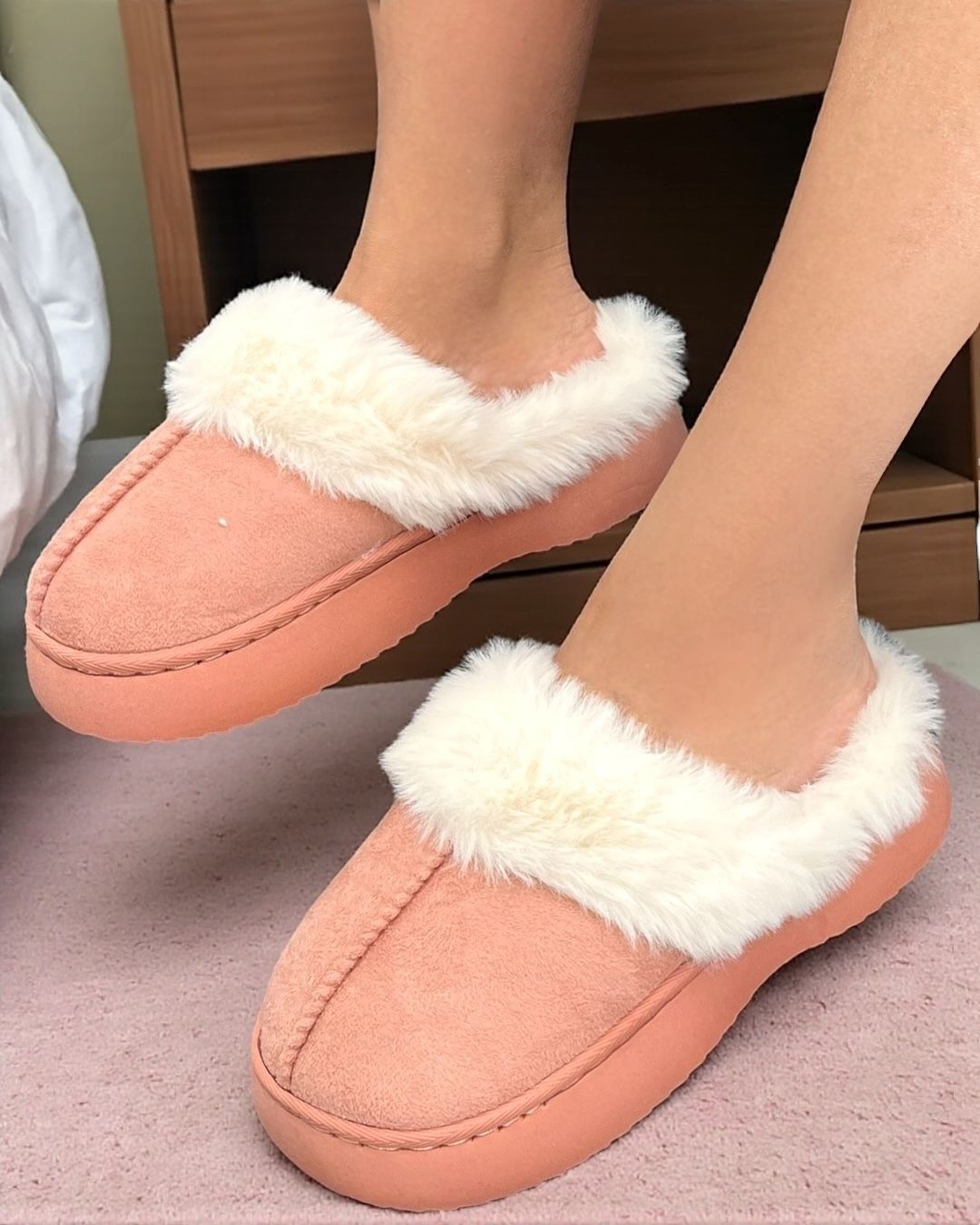 Pink fuzzy slippers