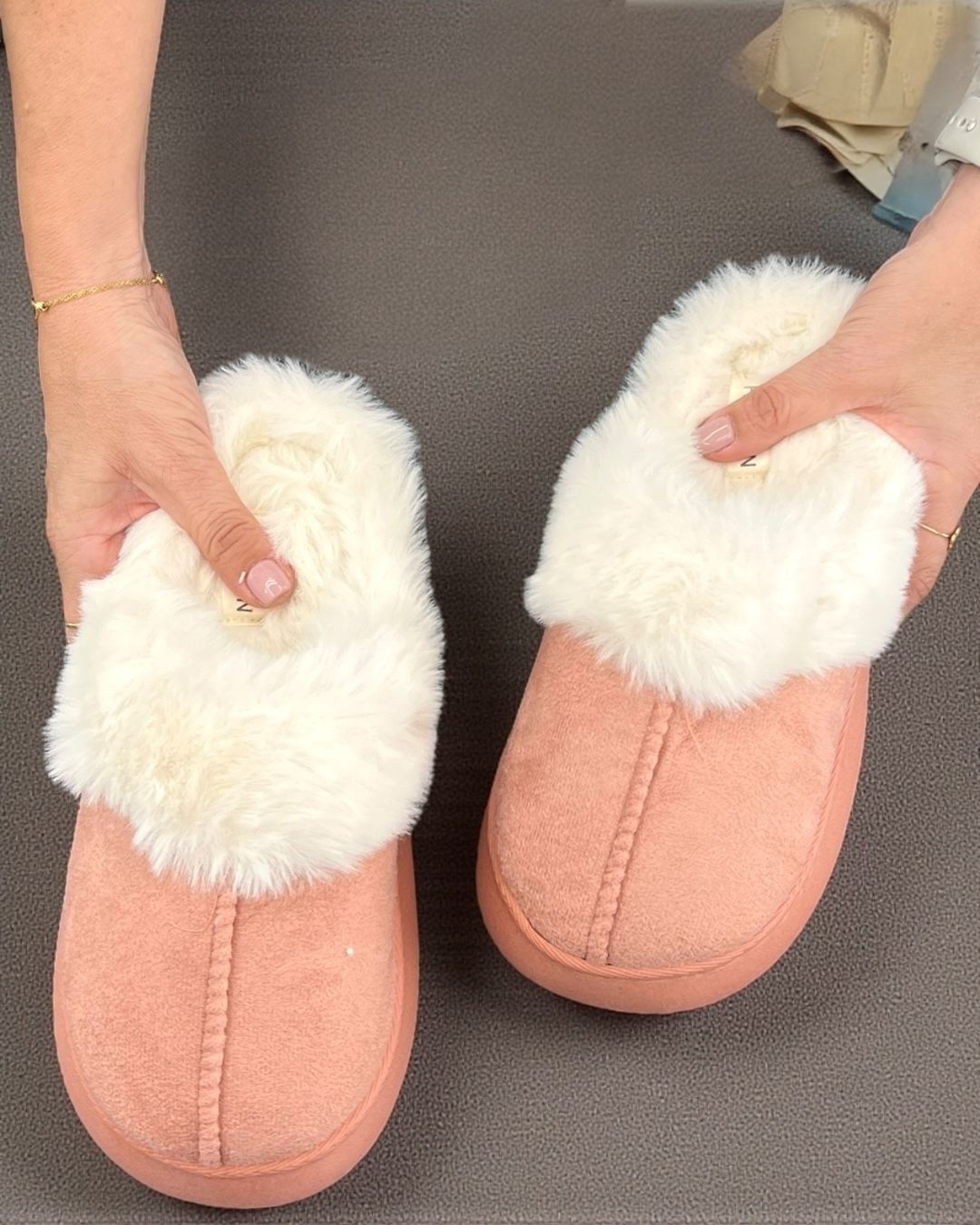 Pink fuzzy slippers
