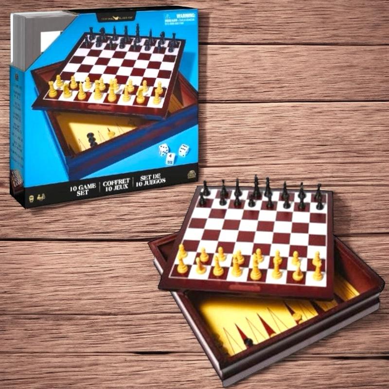 Game cabinet with chess set up beside its retail box on a wood plank background