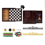 All the pieces laid out, chess, draughts, marbles, mancala stones, dice and pick up sticks