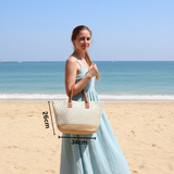Woman holding a straw bag on a beach with measurements displayed