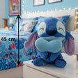 Cornflower blue character plush hugging a mint chest pillow, marked 45cm
