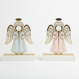 Blue and pink laser cut angels with hands in prayer beneath solid gold halos