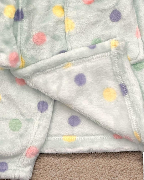 Close up of pastel dots and stitched hem on the soft mint fleece robe