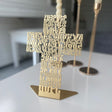 Matte gold Armenian letters cut right through to form a free standing cross