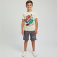 Cream boys set with an Avengers skateboard stack print tee and grey drawstring shorts