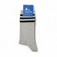 Gray sock with black stripes on a white surface