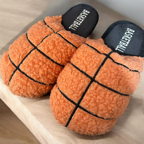 Basketball-themed slippers on a wooden surface