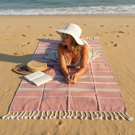 Woman on a beach with a towel and hat, text 'Beach Mode' overlayed.