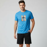 Blue tee with four cartoon bear faces and black shorts